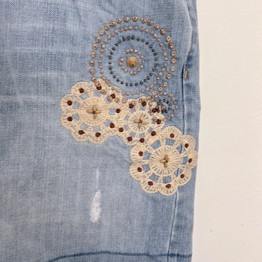 Old Navy’s Jeans ultra low waist stonewashed boho distressed frayed mini skirt.